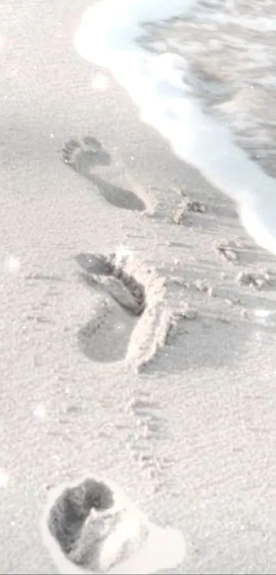 Footprints in soft sand along a tranquil beach.