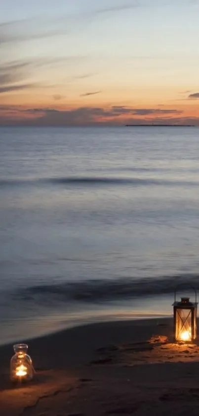 Tranquil beach scene at sunset with glowing lanterns by the ocean.