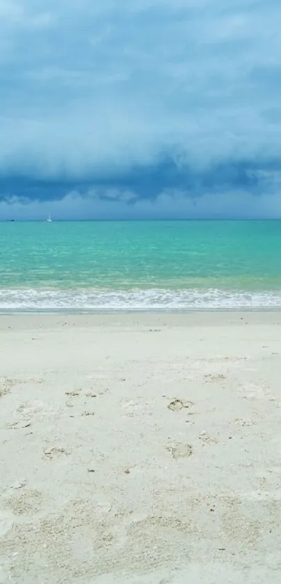 Tranquil beach scene with turquoise water and cloudy sky.