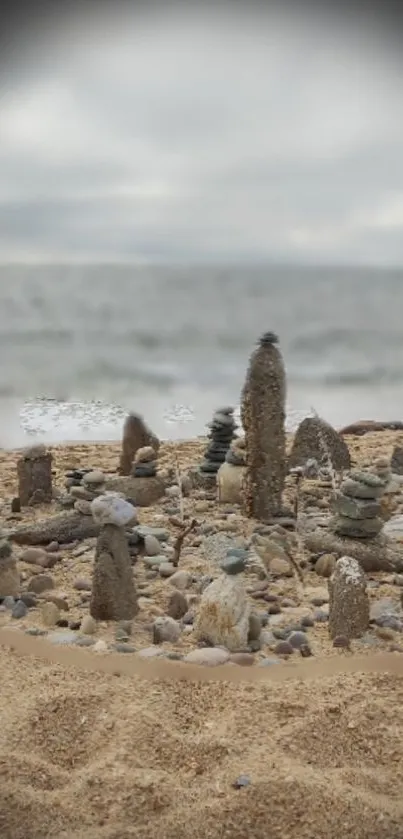 Serene beach with stacked pebbles along the coastline.