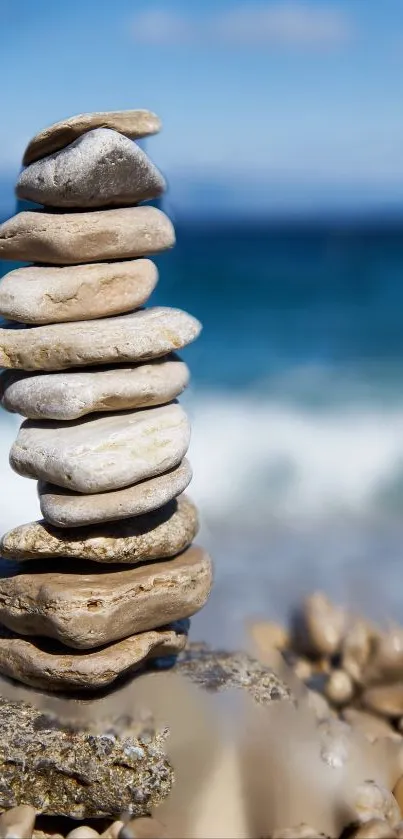 Stone sculpture on a serene beach with ocean in the background.