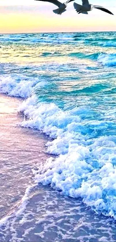 A serene beach with waves and seagulls in flight under a colorful sky.