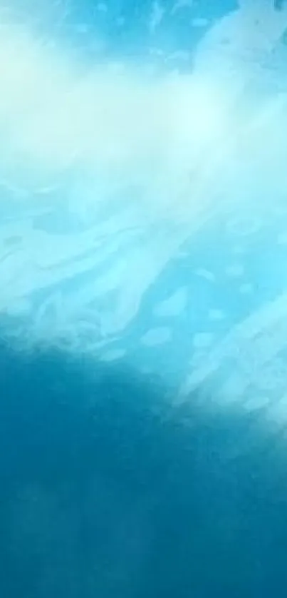 A serene blue pool reflecting sunlight, ideal for a calming phone wallpaper.