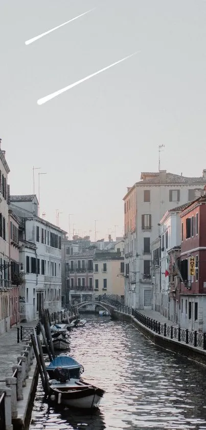 Serene pastel-toned canal cityscape at sunset.