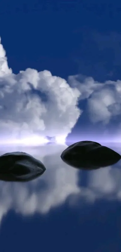 Tranquil clouds reflecting on calm water with stones in foreground.