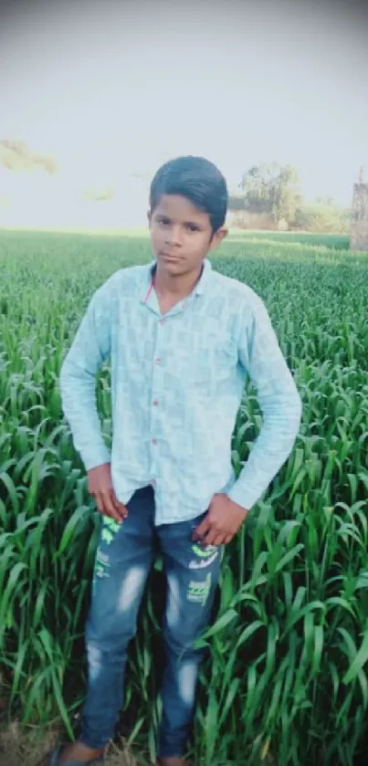 Person standing in lush green field with serene rural backdrop.