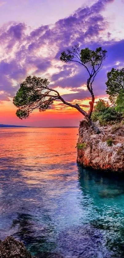 Vibrant island sunset with colorful sky and serene ocean view.