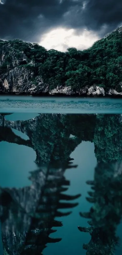 Serene lake with forest reflection and misty sky.