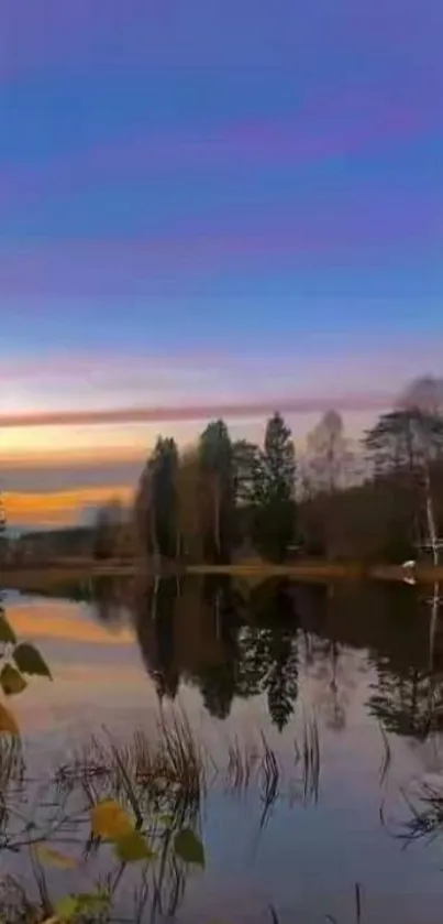 Serene sunset over a tranquil lake with reflective water.