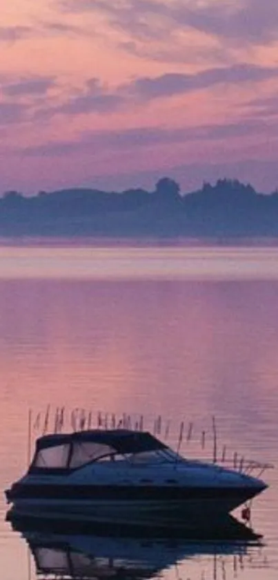 Boat on tranquil lake during purple sunset.