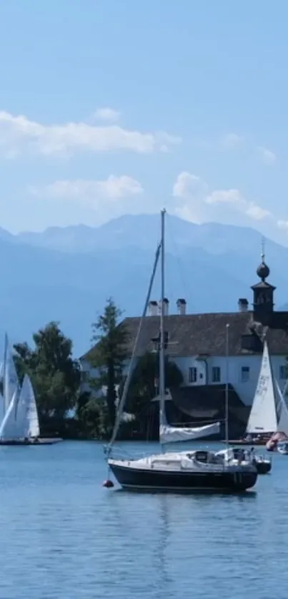 Sailboats on a serene lake under a clear blue sky.