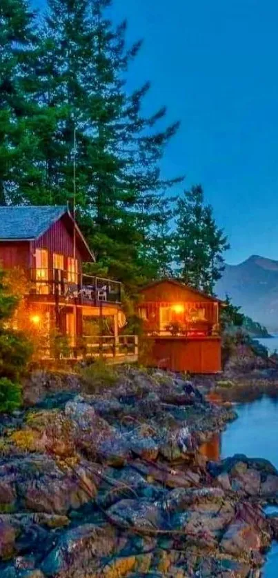 Serene lakeside cabin with glowing lights at dusk against a blue lake.