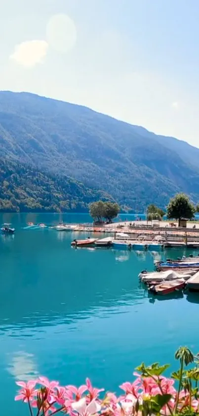 Tranquil lakeside wallpaper with turquoise lake and hills.