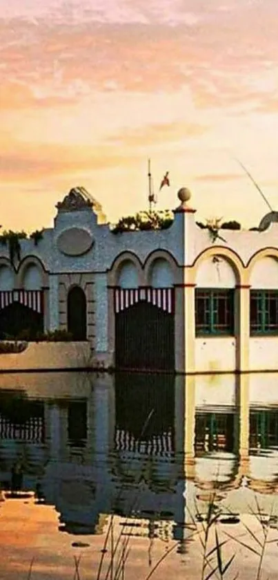 Lakeside white building reflecting in sunset waters, creating a serene and calming vista.