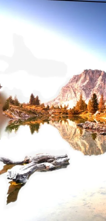 Stunning mountain lake reflecting autumn trees under a clear blue sky.