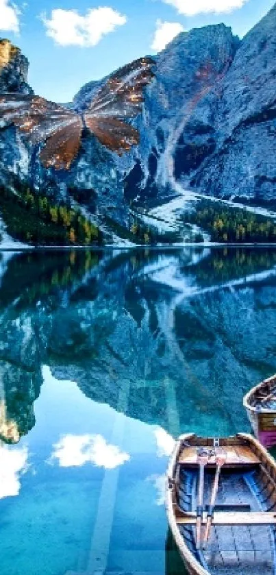 Scenic lake view with mountain reflections and boats.