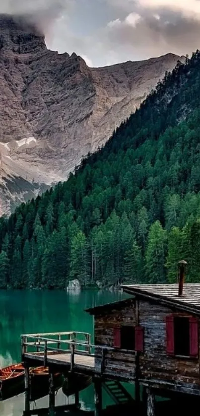 Mountain lake with forest and cabin wallpaper.