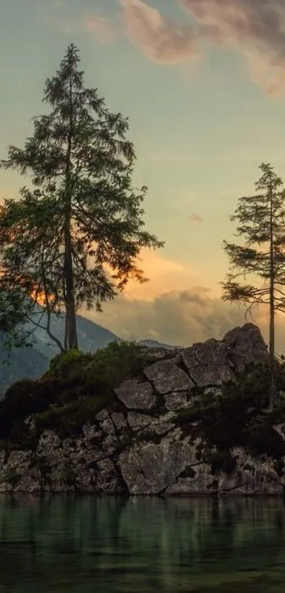 Peaceful sunset over a mountain lake with pine trees and rocky landscape.