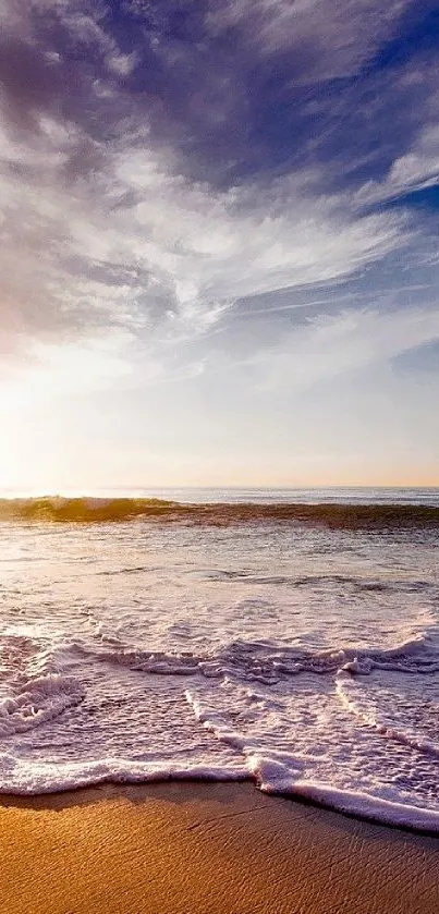 Tranquil ocean sunrise at the beach with waves and vibrant sky.