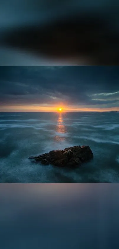 Tranquil ocean sunset with calm waters and a beautiful horizon.