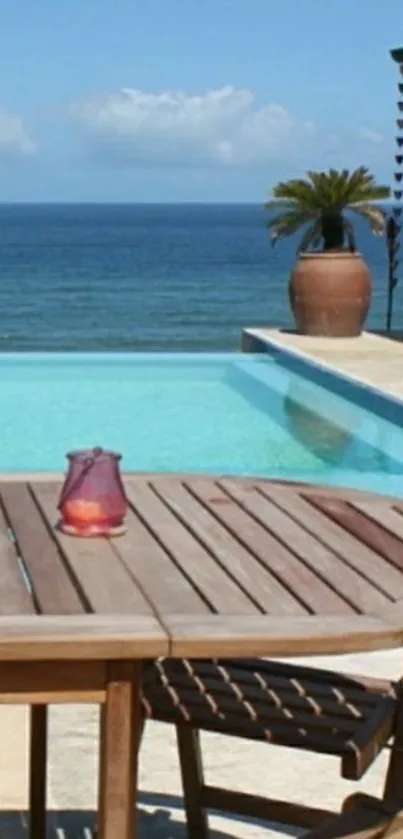 Ocean view with pool and wooden table.