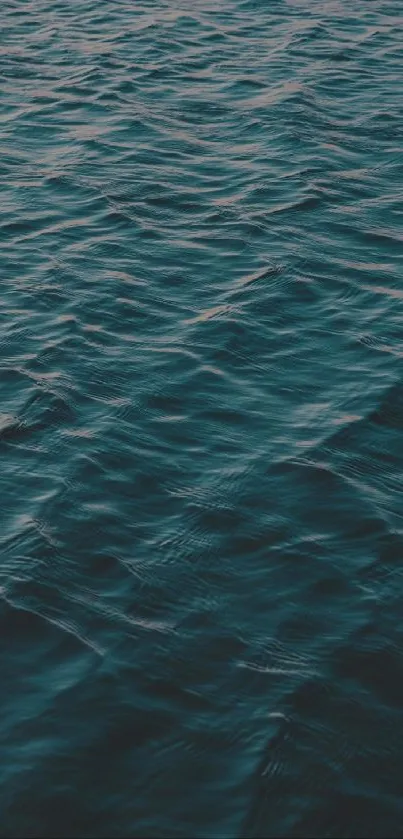 A serene view of ocean waves under soft lighting.