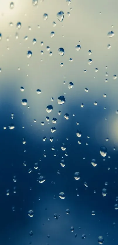 Raindrops on a window creating a serene mobile wallpaper.