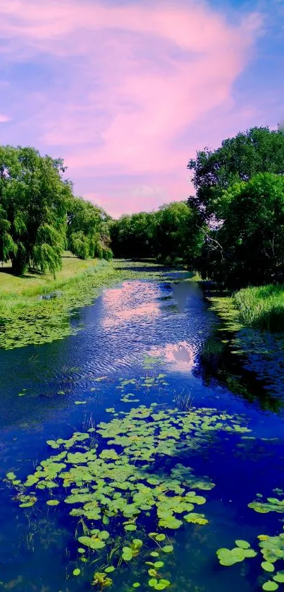 Tranquil river with greenery and blue sky wallpaper.