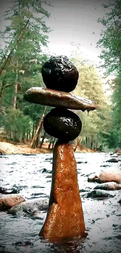 Balanced stones in a tranquil forest river setting, surrounded by greenery.