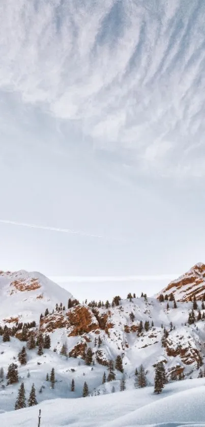 Snowy mountain landscape under a blue sky, perfect for serene winter backgrounds.