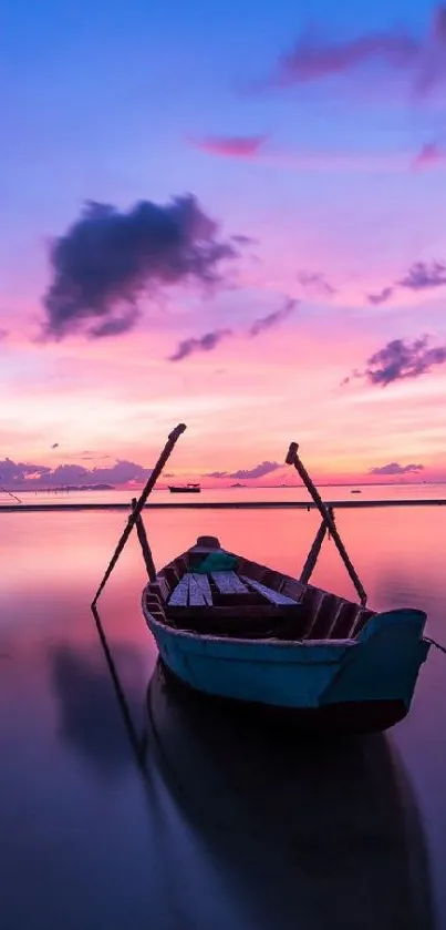 Boat at sunset with purple sky and calm water, ideal for mobile wallpaper.