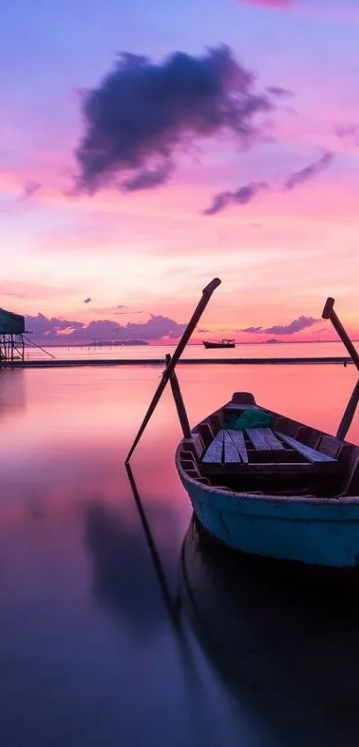 Boat on a sunset-lit lake with pink skies and tranquil waters.