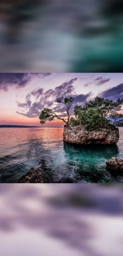 Beautiful sunset over a small tree-covered island in tranquil waters.