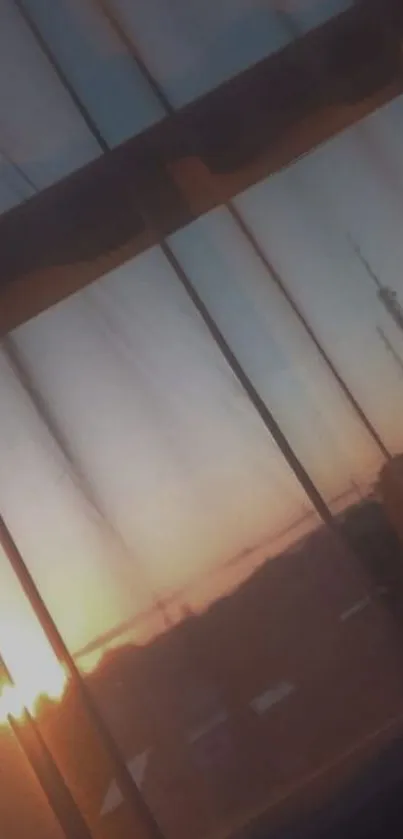 Serene sunset view through delicate curtains.