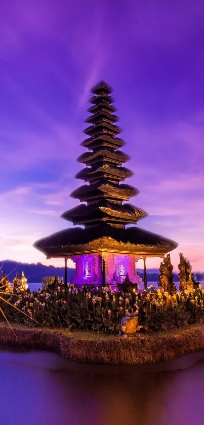 Temple with a purple sunset sky, reflecting on water.