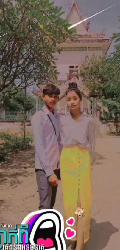 Couple standing in a serene temple garden with vibrant colors.