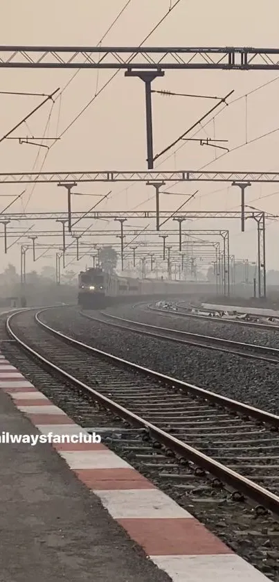 Train on curved tracks during a calm morning.