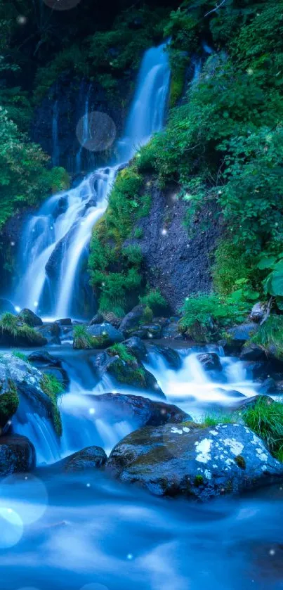 Tranquil waterfall with lush green surroundings in nature wallpaper.