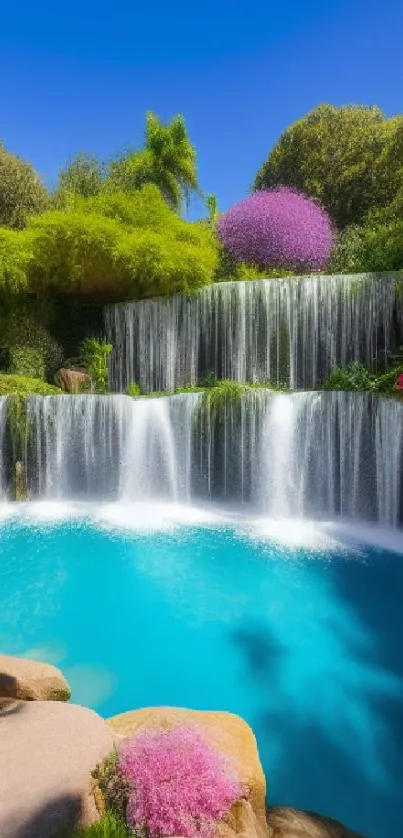 Scenic waterfall with a cyan blue pond and lush green surroundings.