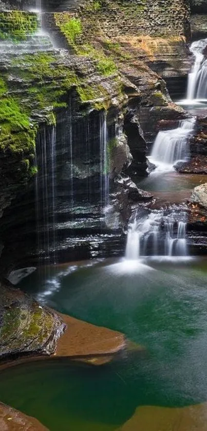 Peaceful waterfall with lush green surroundings for mobile wallpaper