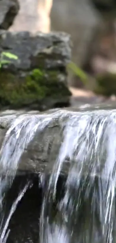 Tranquil waterfall with lush greenery, ideal for phone wallpaper.