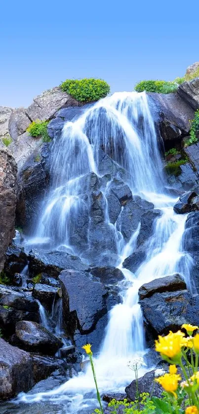 Tranquil waterfall cascading over rocks with vibrant nature background.