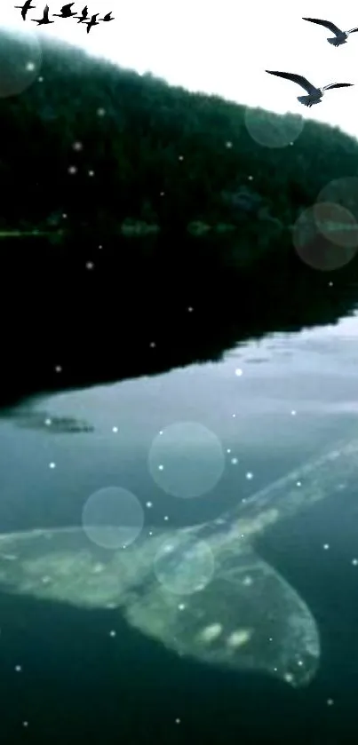 Whale tail reflecting in calm ocean waters amidst tranquil greenery.