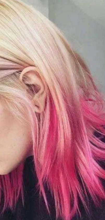 Blonde hair with vibrant pink tips, a stylish and trendy look for mobile wallpaper.