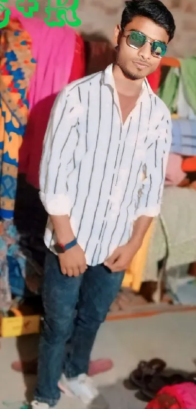 Man in striped shirt with colorful clothes.