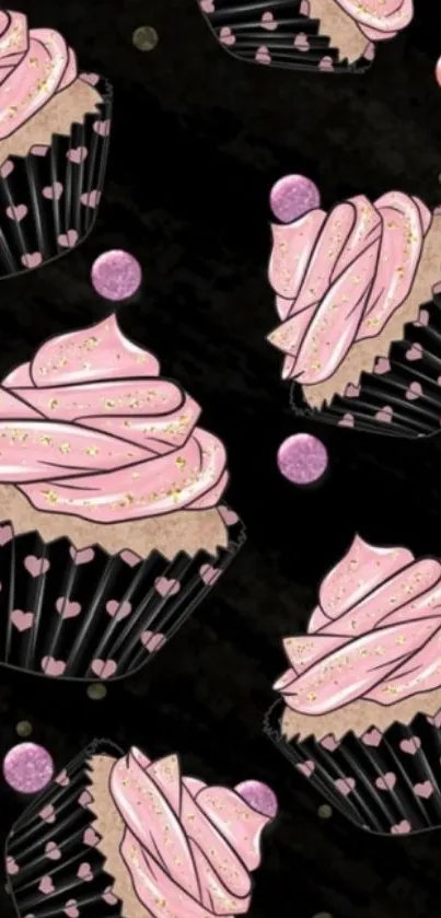 Pink frosted cupcakes on dark wallpaper.