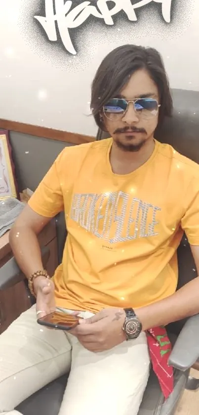 Young man in yellow t-shirt, relaxed and trendy.