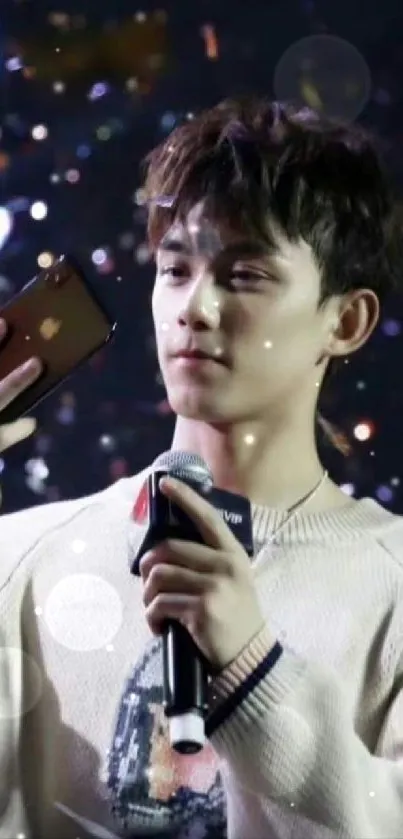 Young man holding a smartphone with dynamic background.