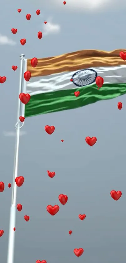 Indian flag waving with red hearts against a blue sky.