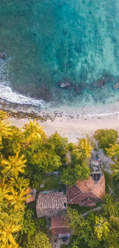 Aerial view of tropical beach with lush greenery and turquoise water.